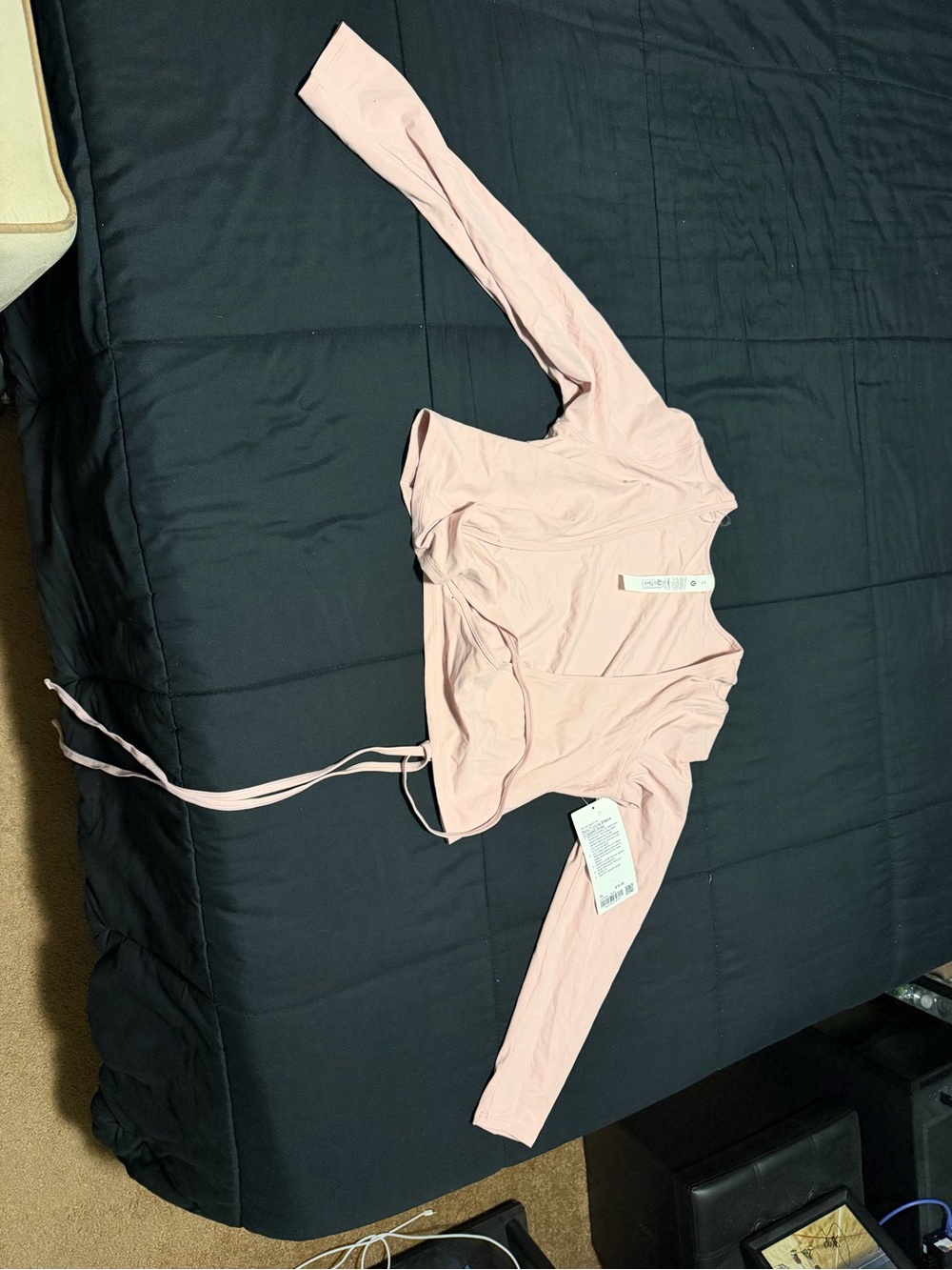 lululemon athletica Light Pink Long Sleeve Cropped Top